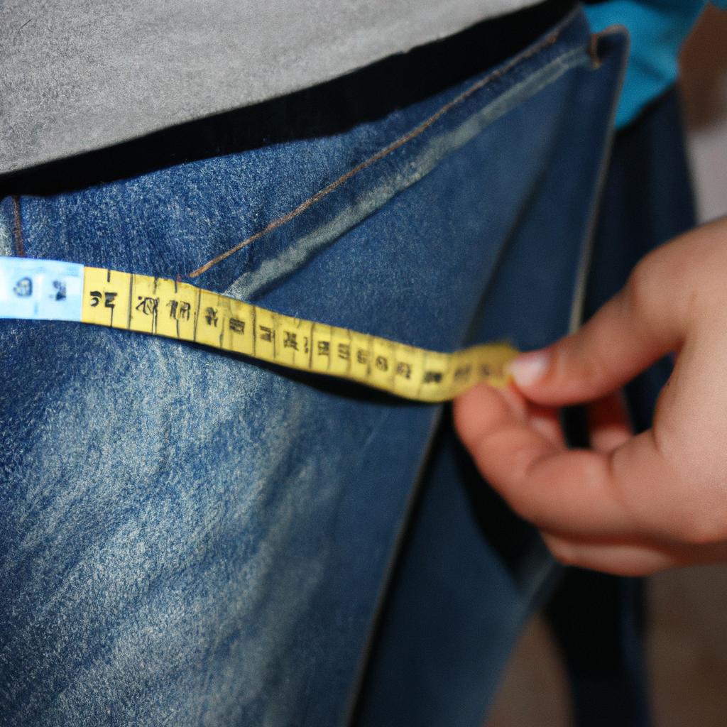 Person measuring children's jeans rise